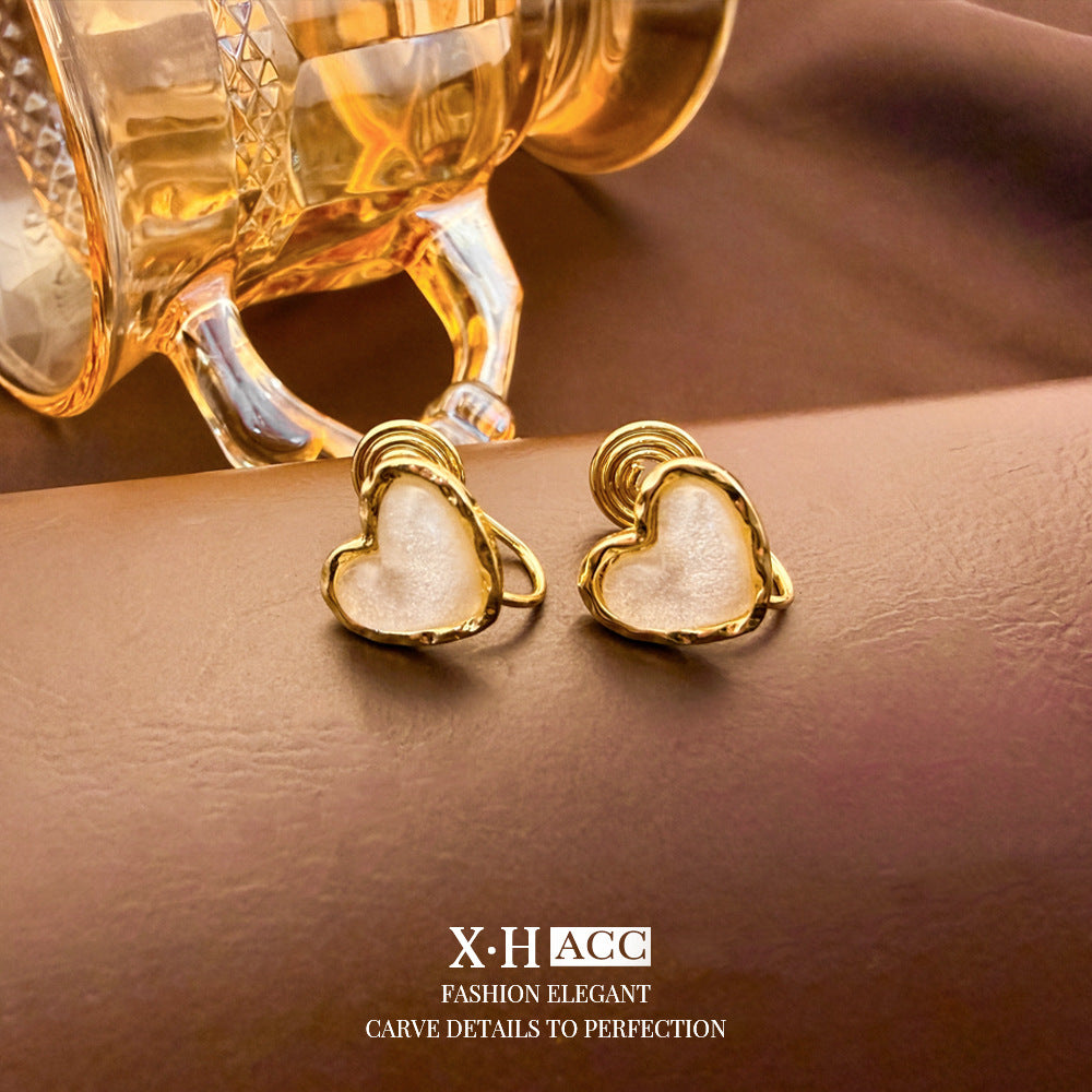 Elegant Heart Shape Clip Earrings For Women In Gold Alloy With Electroplated Finish And Artificial Pearl Inlay