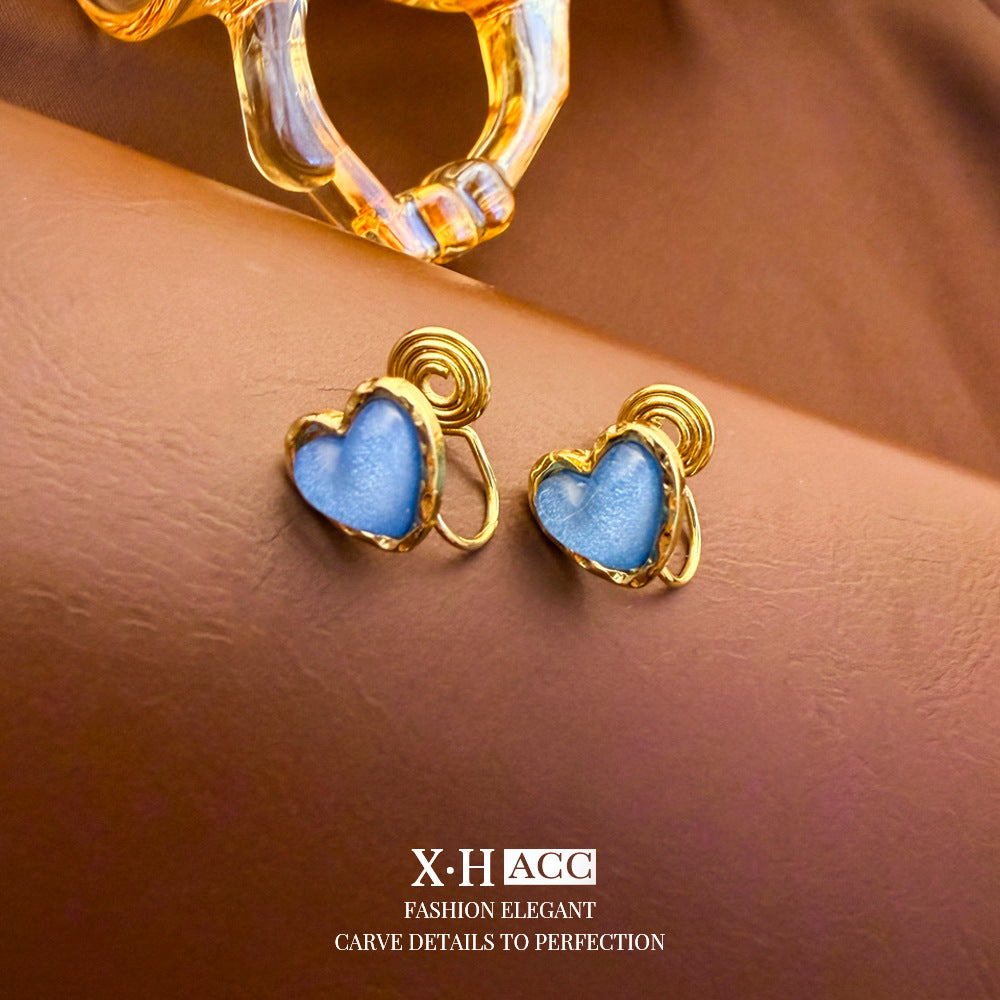 Elegant Heart Shape Clip Earrings For Women In Gold Alloy With Electroplated Finish And Artificial Pearl Inlay