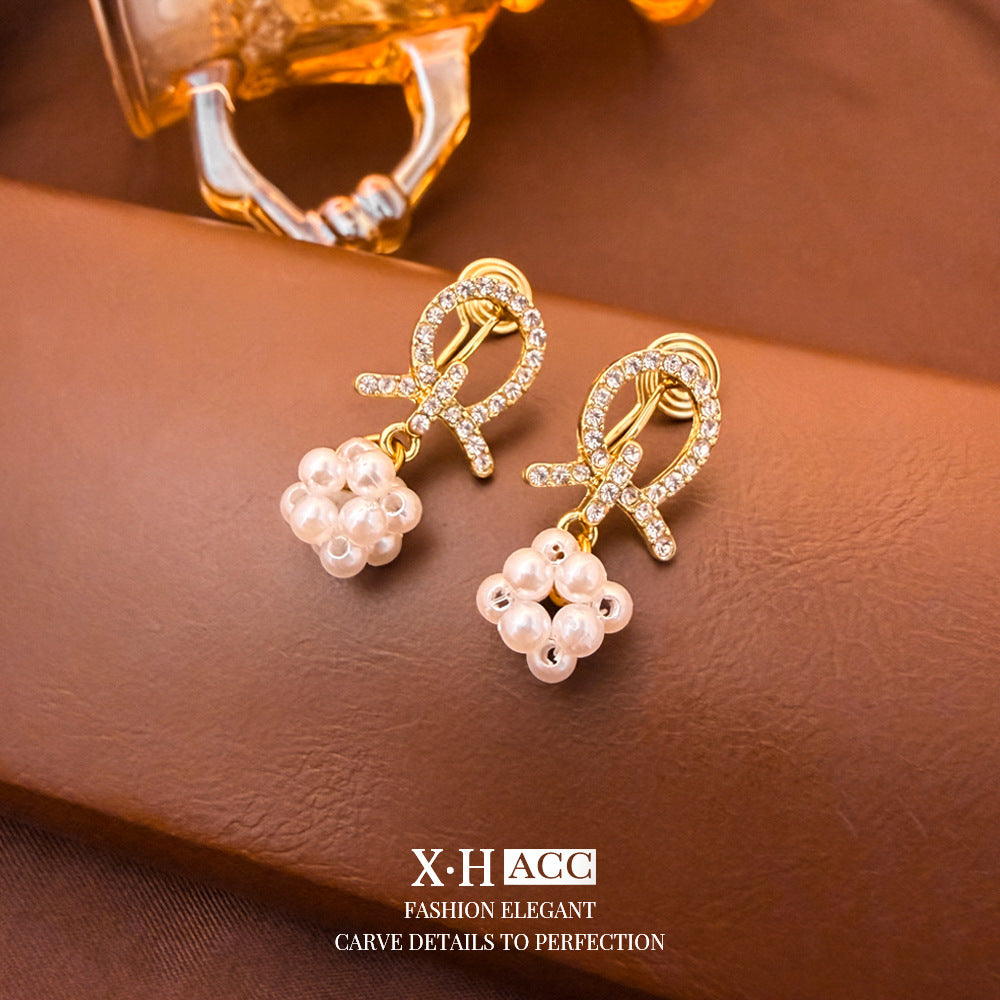 Elegant Heart Shape Clip Earrings For Women In Gold Alloy With Electroplated Finish And Artificial Pearl Inlay