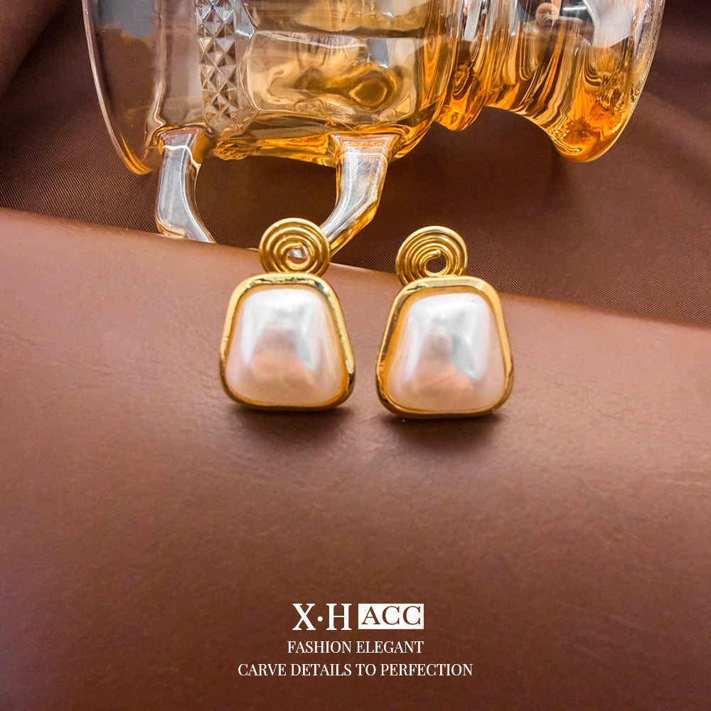 Elegant Heart Shape Clip Earrings For Women In Gold Alloy With Electroplated Finish And Artificial Pearl Inlay