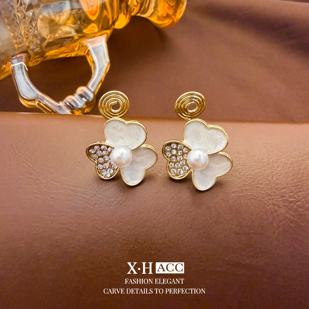 Elegant Heart Shape Clip Earrings For Women In Gold Alloy With Electroplated Finish And Artificial Pearl Inlay