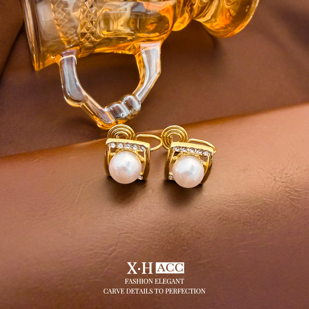 Elegant Heart Shape Clip Earrings For Women In Gold Alloy With Electroplated Finish And Artificial Pearl Inlay