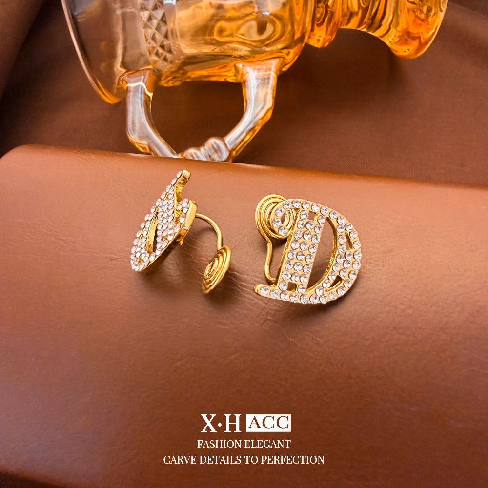 Elegant Heart Shape Clip Earrings For Women In Gold Alloy With Electroplated Finish And Artificial Pearl Inlay