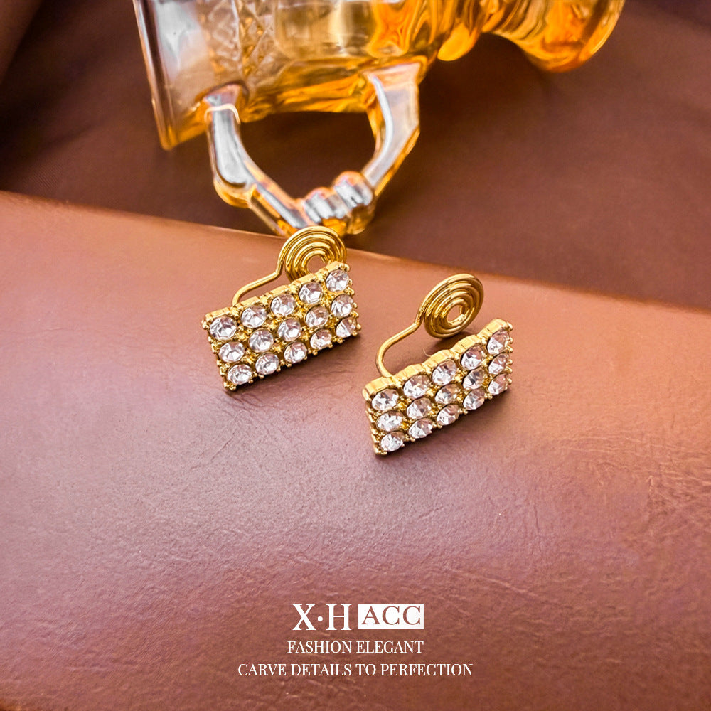 Elegant Heart Shape Clip Earrings For Women In Gold Alloy With Electroplated Finish And Artificial Pearl Inlay