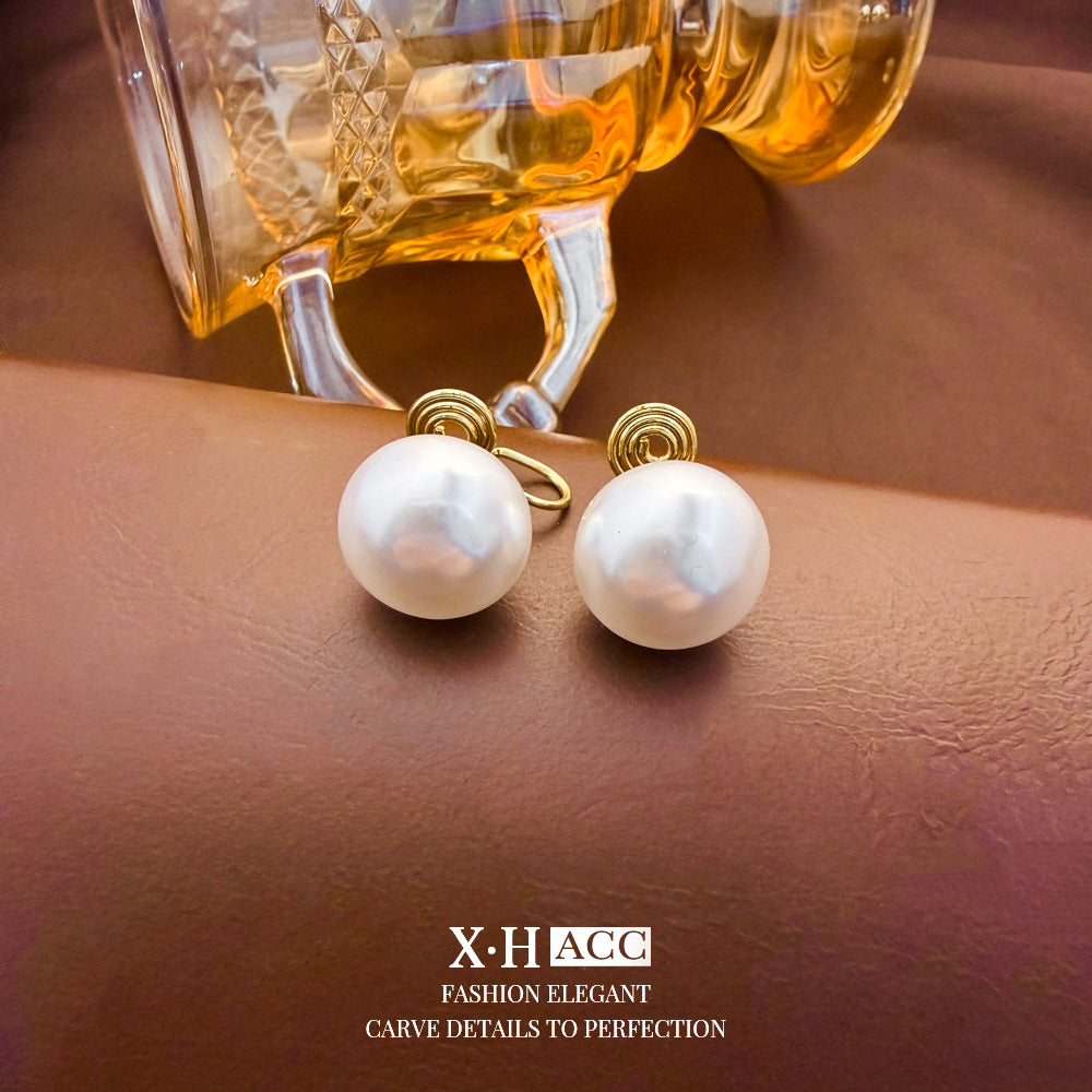 Elegant Heart Shape Clip Earrings For Women In Gold Alloy With Electroplated Finish And Artificial Pearl Inlay