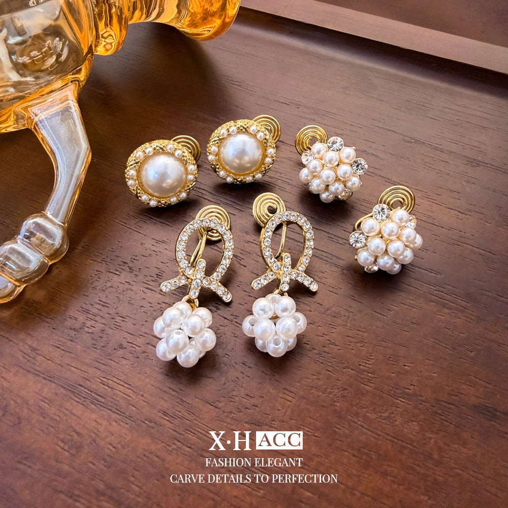 Elegant Heart Shape Clip Earrings For Women In Gold Alloy With Electroplated Finish And Artificial Pearl Inlay