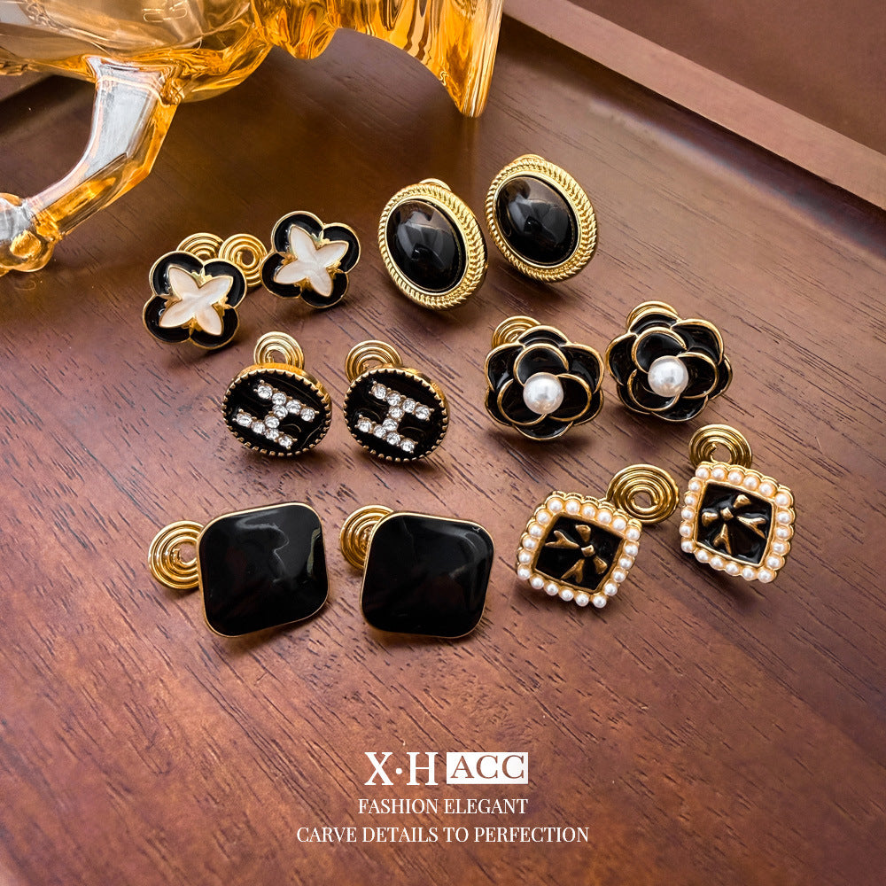 Elegant Heart Shape Clip Earrings For Women In Gold Alloy With Electroplated Finish And Artificial Pearl Inlay