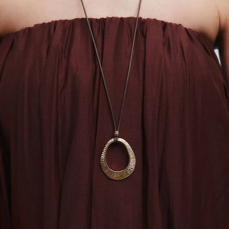 Luxurious Gold Circle Braid Pendant Necklace For Women With Copper Slider Chain