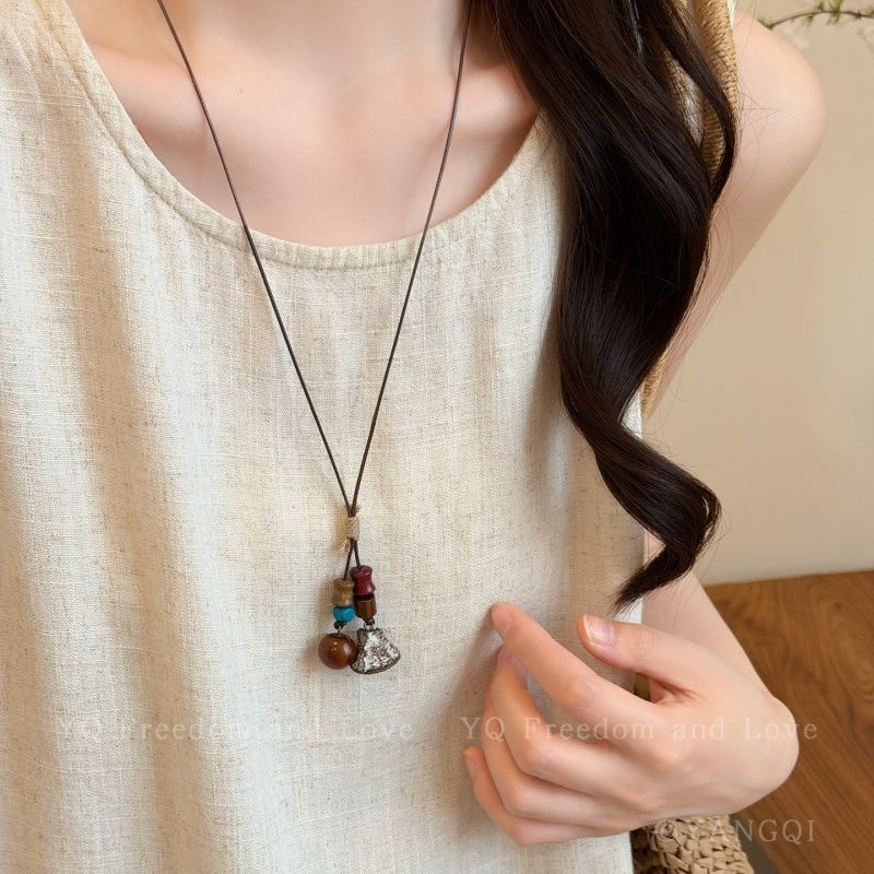 Bohemian Ethnic Long Necklace For Women Featuring Wood Carving Pendant On Cord String