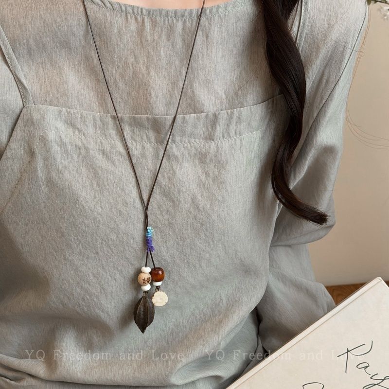 Bohemian Ethnic Long Necklace For Women Featuring Wood Carving Pendant On Cord String