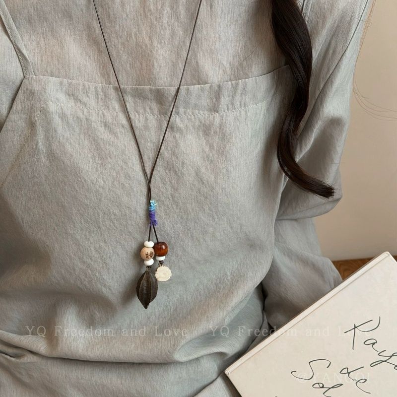 Ethnic Style Acrylic Plant Braid Necklace For Women With Woven Chain And Alloy Pendant