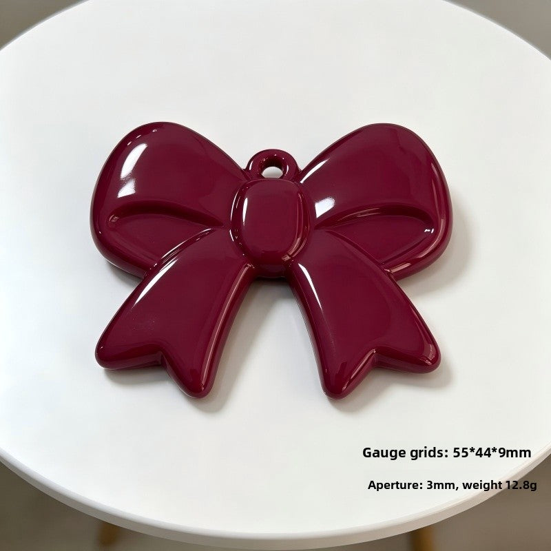 Bow Tie Pendant In Acrylic With KC Golden Plated Finish Featuring Electroplated Silver Jewelry Accessories