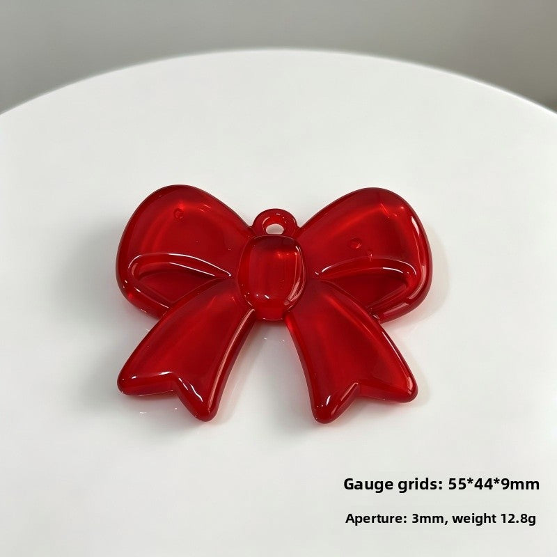 Bow Tie Pendant In Acrylic With KC Golden Plated Finish Featuring Electroplated Silver Jewelry Accessories