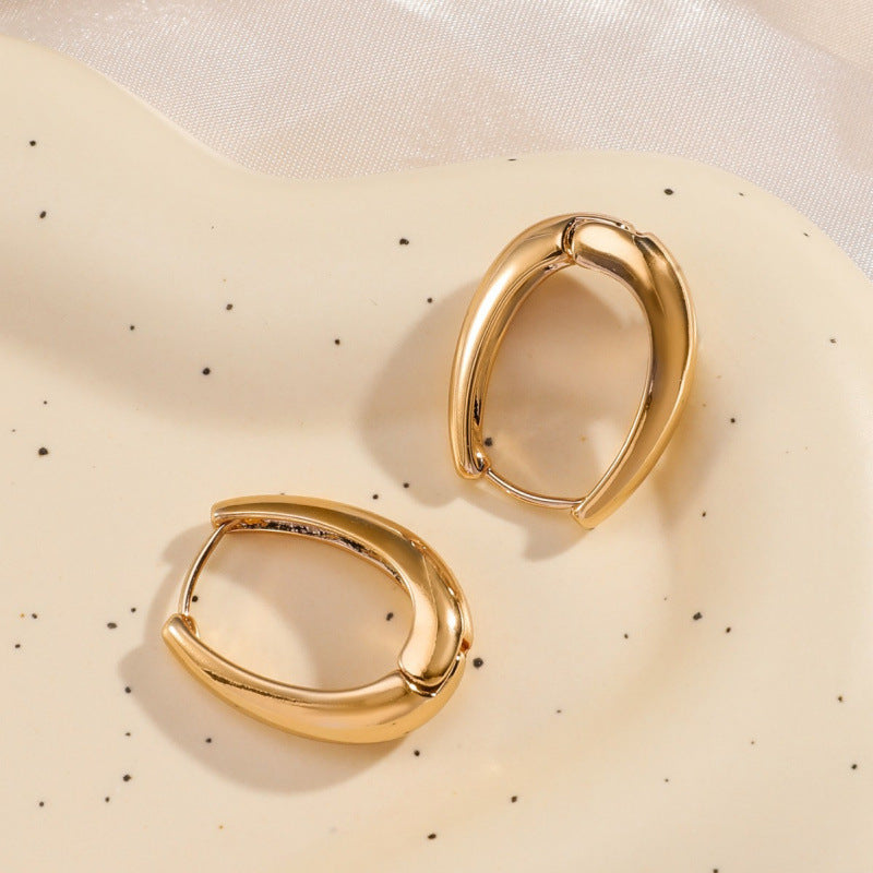 Oval Gold Earrings For Women Featuring Copper Posts With Simple Style Design