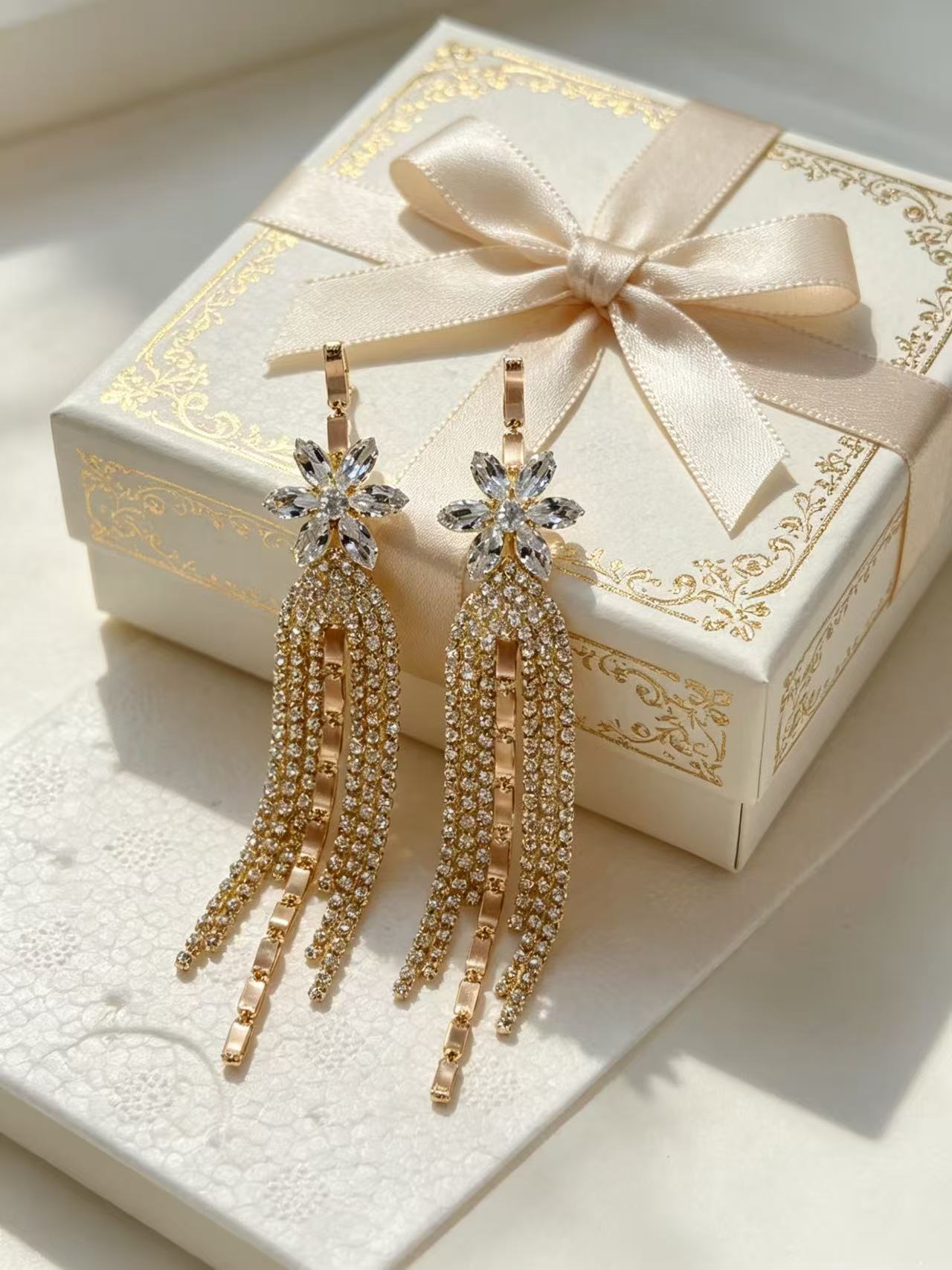 Exaggerated Bow Tie Earrings For Women With Gold Tassel And Rhinestone Inlay