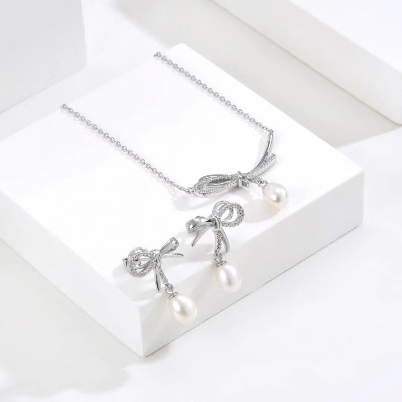 Elegant Bow Tie Earrings For Women In Silver Featuring 925 Sterling Silver Posts