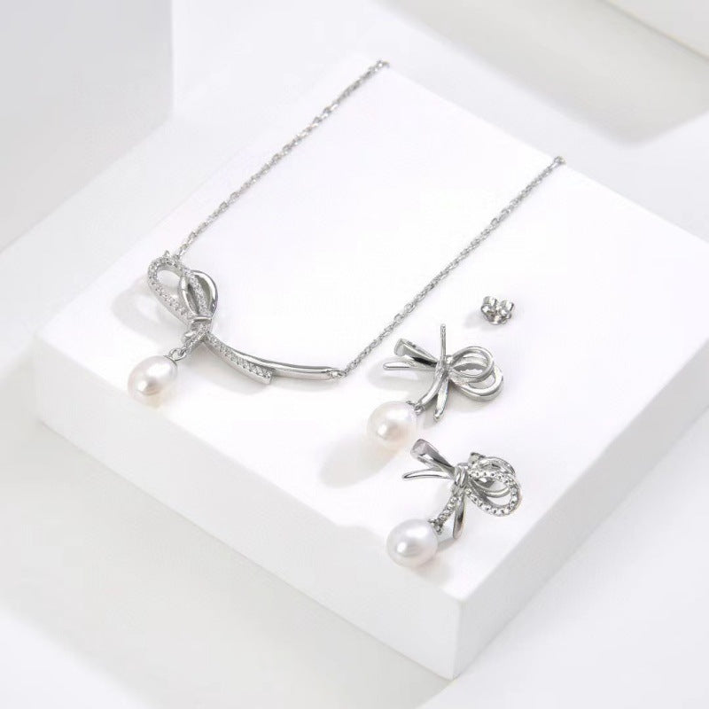 Elegant Bow Tie Earrings For Women In Silver Featuring 925 Sterling Silver Posts