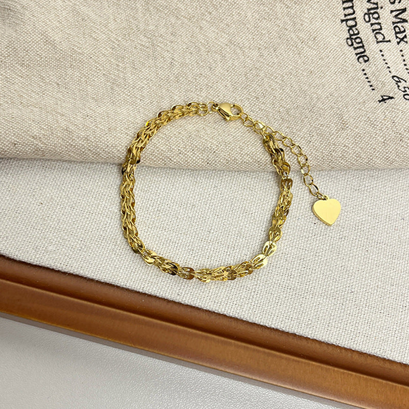 Leaf Pattern Women’s Bracelet In Titanium Steel With 18K Real Gold Electroplated Finish, Available In Gold