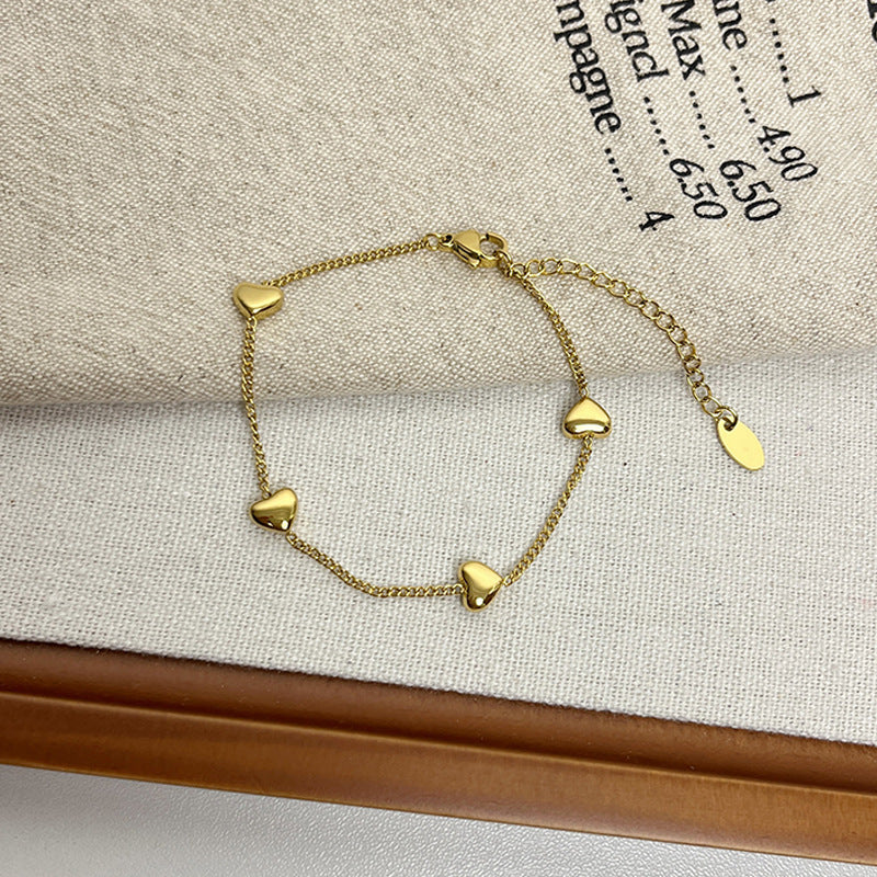 Leaf Pattern Women’s Bracelet In Titanium Steel With 18K Real Gold Electroplated Finish, Available In Gold