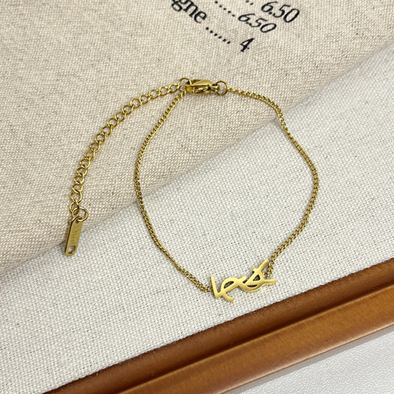 Leaf Pattern Women’s Bracelet In Titanium Steel With 18K Real Gold Electroplated Finish, Available In Gold