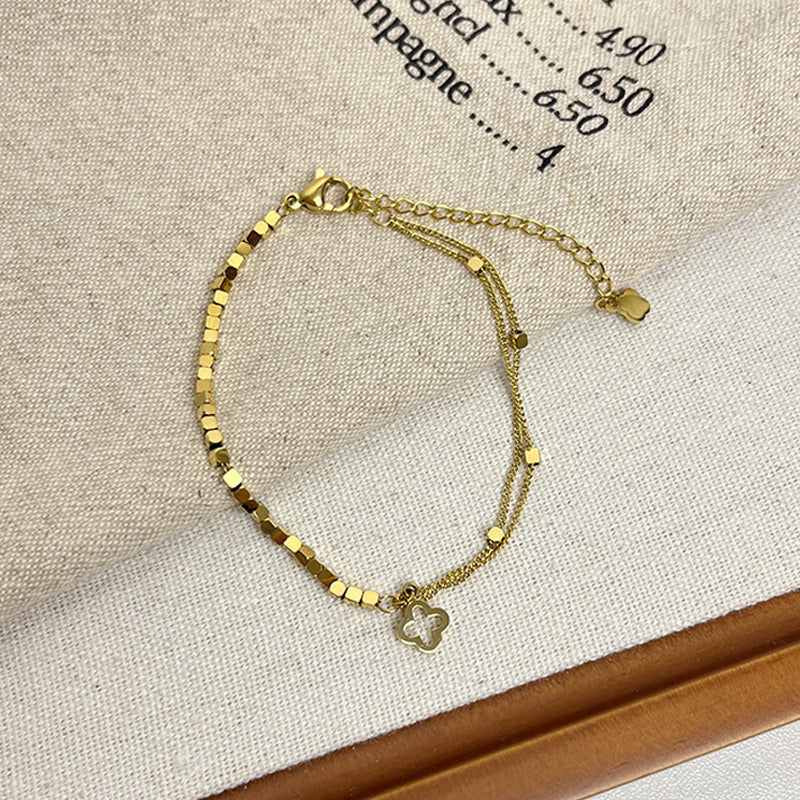 Leaf Pattern Women’s Bracelet In Titanium Steel With 18K Real Gold Electroplated Finish, Available In Gold