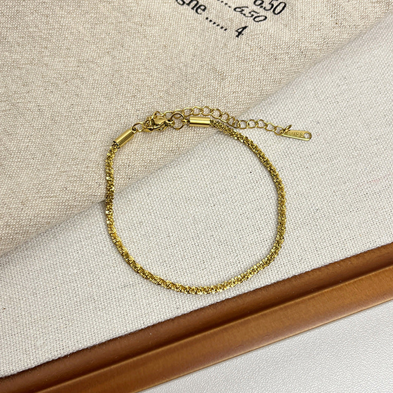 Leaf Pattern Women’s Bracelet In Titanium Steel With 18K Real Gold Electroplated Finish, Available In Gold