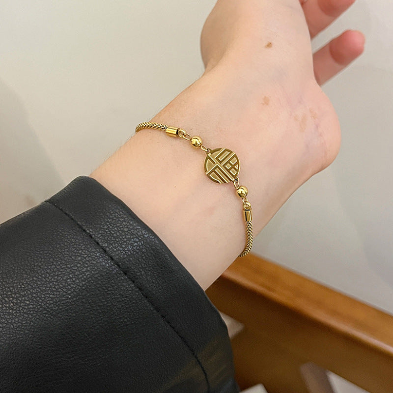 Leaf Pattern Women’s Bracelet In Titanium Steel With 18K Real Gold Electroplated Finish, Available In Gold
