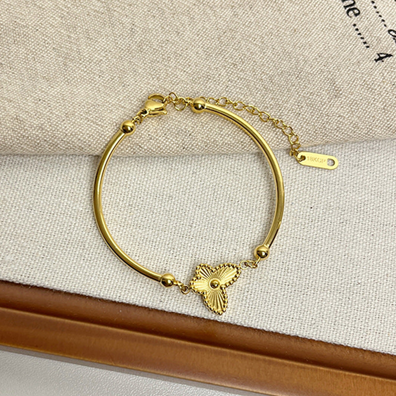 Leaf Pattern Women’s Bracelet In Titanium Steel With 18K Real Gold Electroplated Finish, Available In Gold