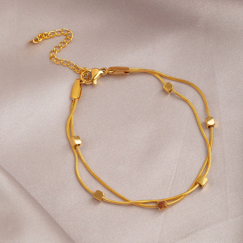 Leaf Pattern Women’s Bracelet In Titanium Steel With 18K Real Gold Electroplated Finish, Available In Gold