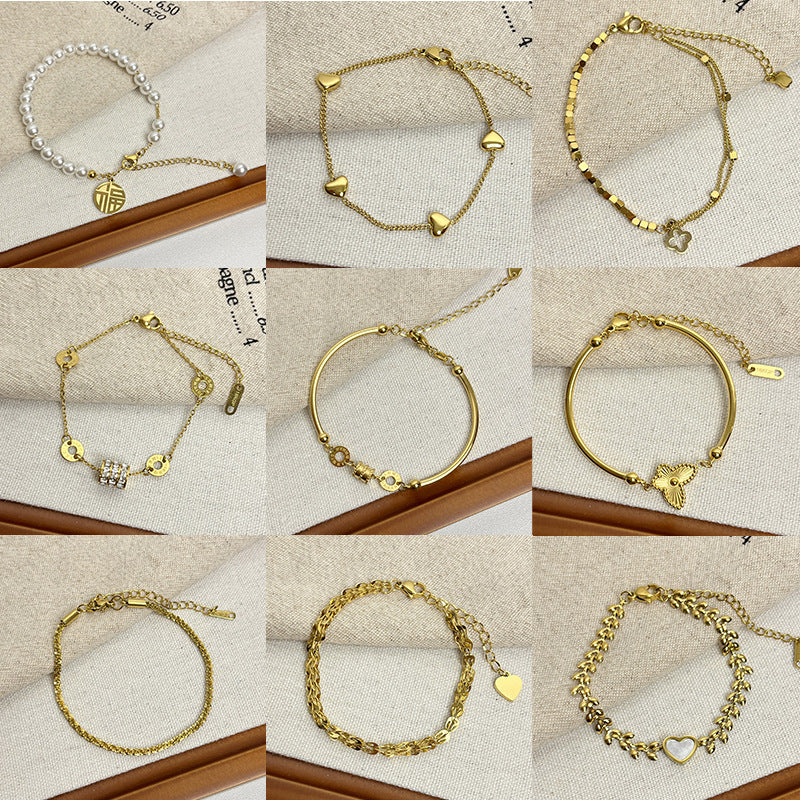 Leaf Pattern Women’s Bracelet In Titanium Steel With 18K Real Gold Electroplated Finish, Available In Gold
