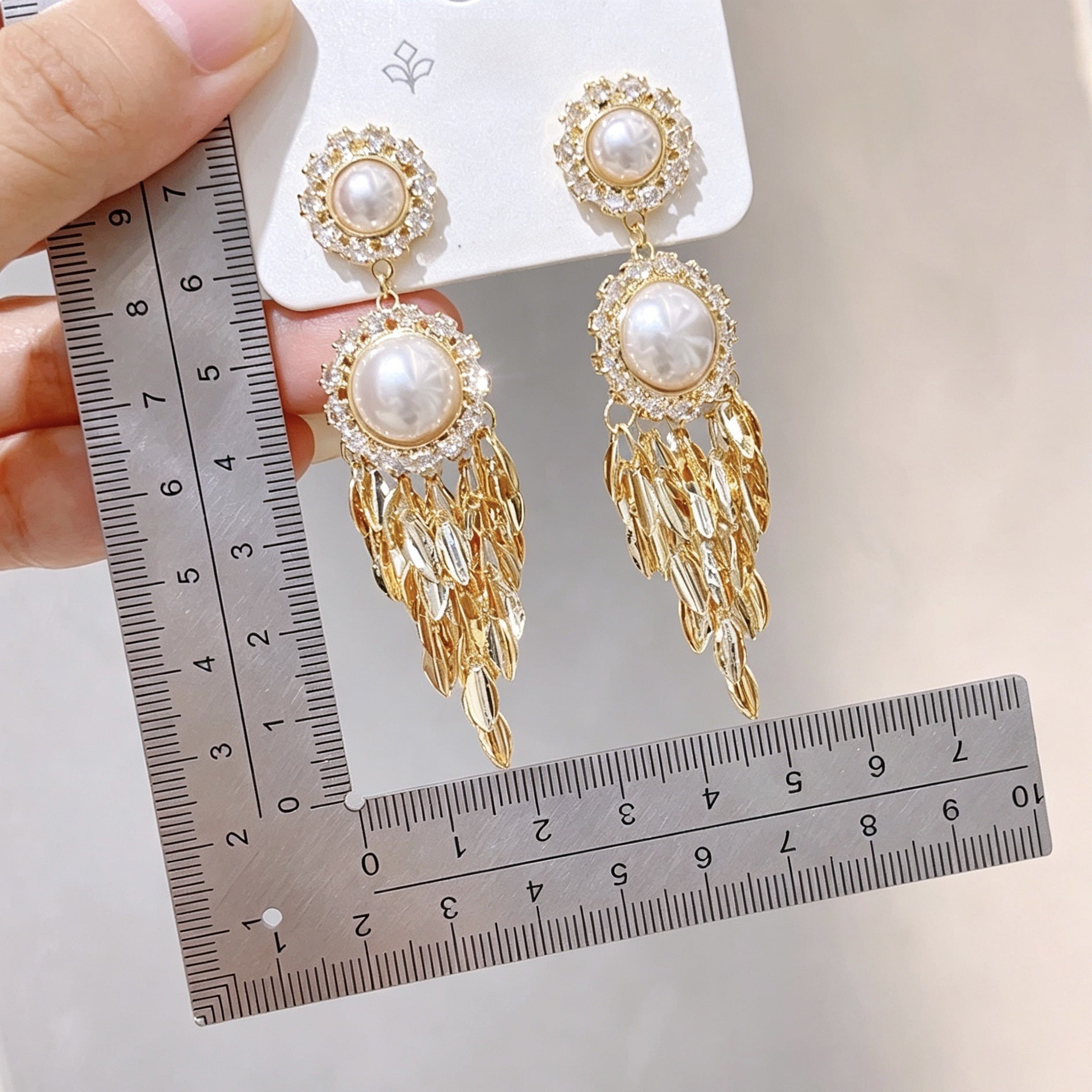 Leaves Tassel Earrings For Women Featuring Electroplated Gold Finish With Copper Ear Pins