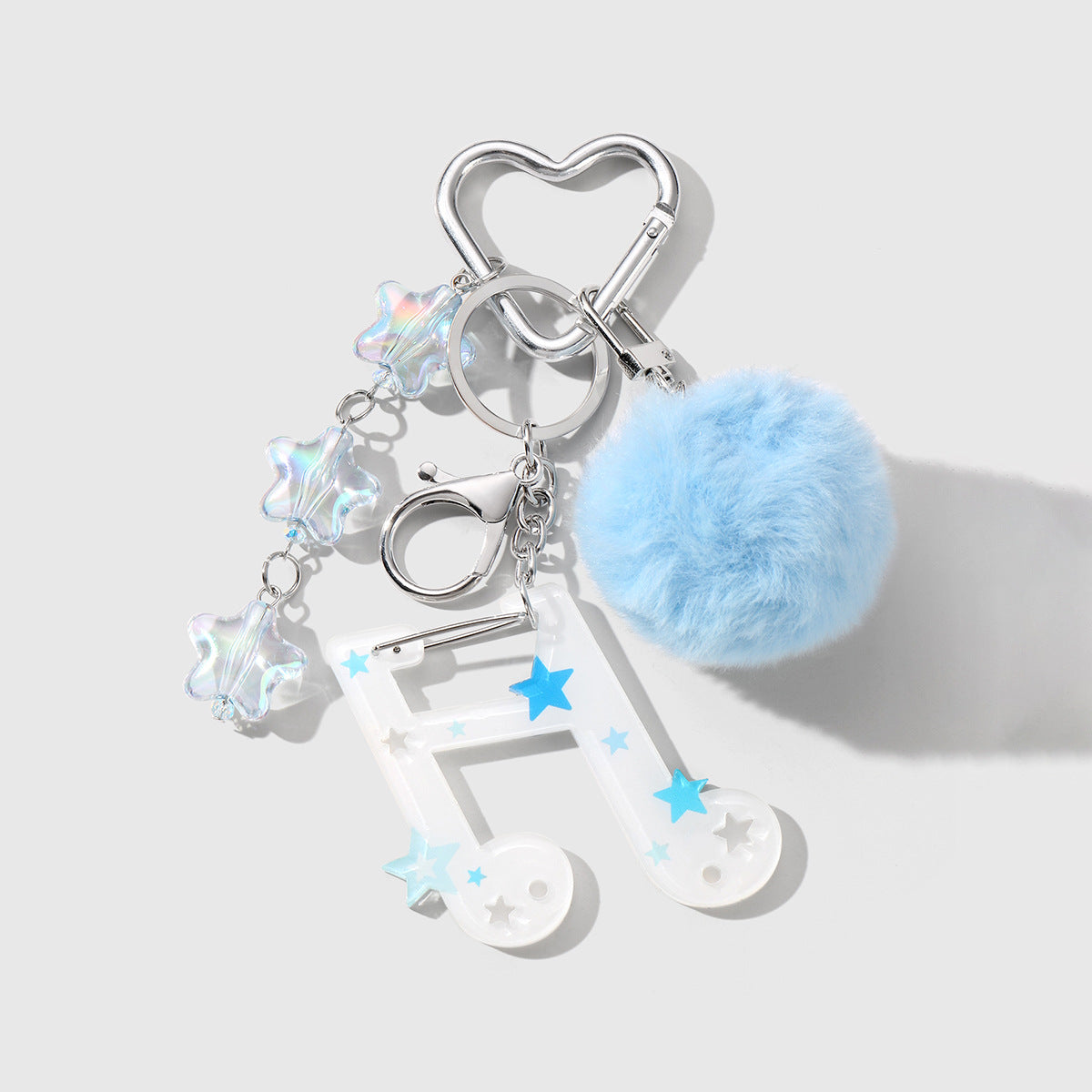 Fuzzy Ball Key Chain In White Featuring Durable Alloy Material