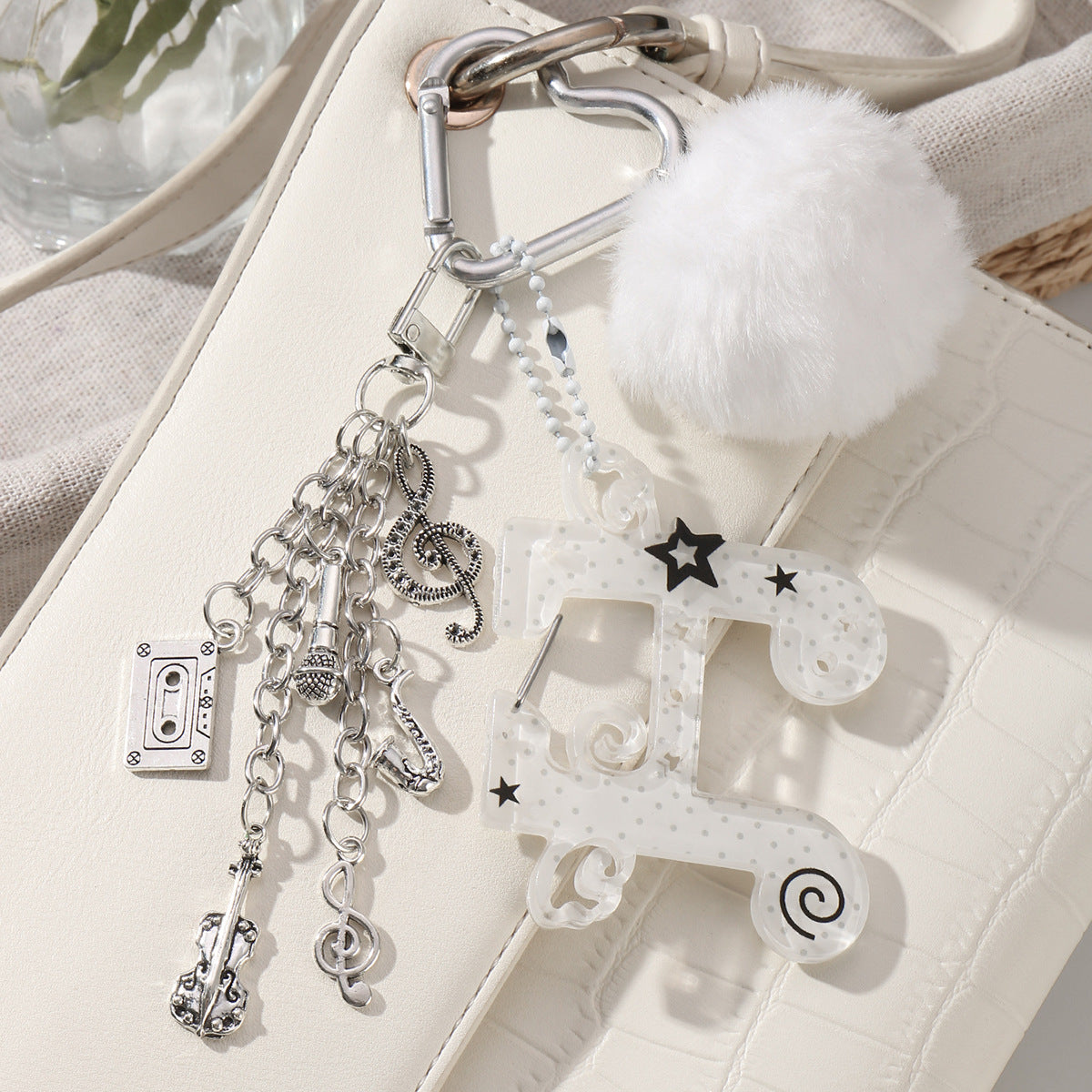 Fuzzy Ball Key Chain In White Featuring Durable Alloy Material