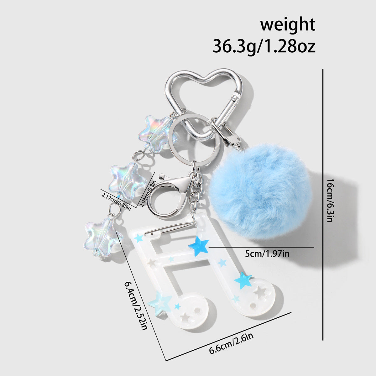 Fuzzy Ball Key Chain In White Featuring Durable Alloy Material