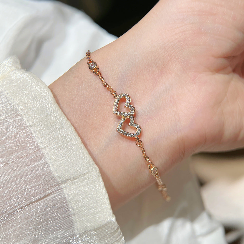 Double Heart Elaborate Copper Bracelet For Women With Electroplated Gold Plating And Zircon Inlay