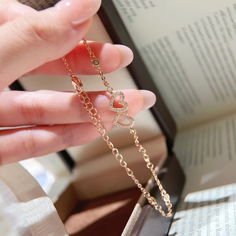 Double Heart Elaborate Copper Bracelet For Women With Electroplated Gold Plating And Zircon Inlay