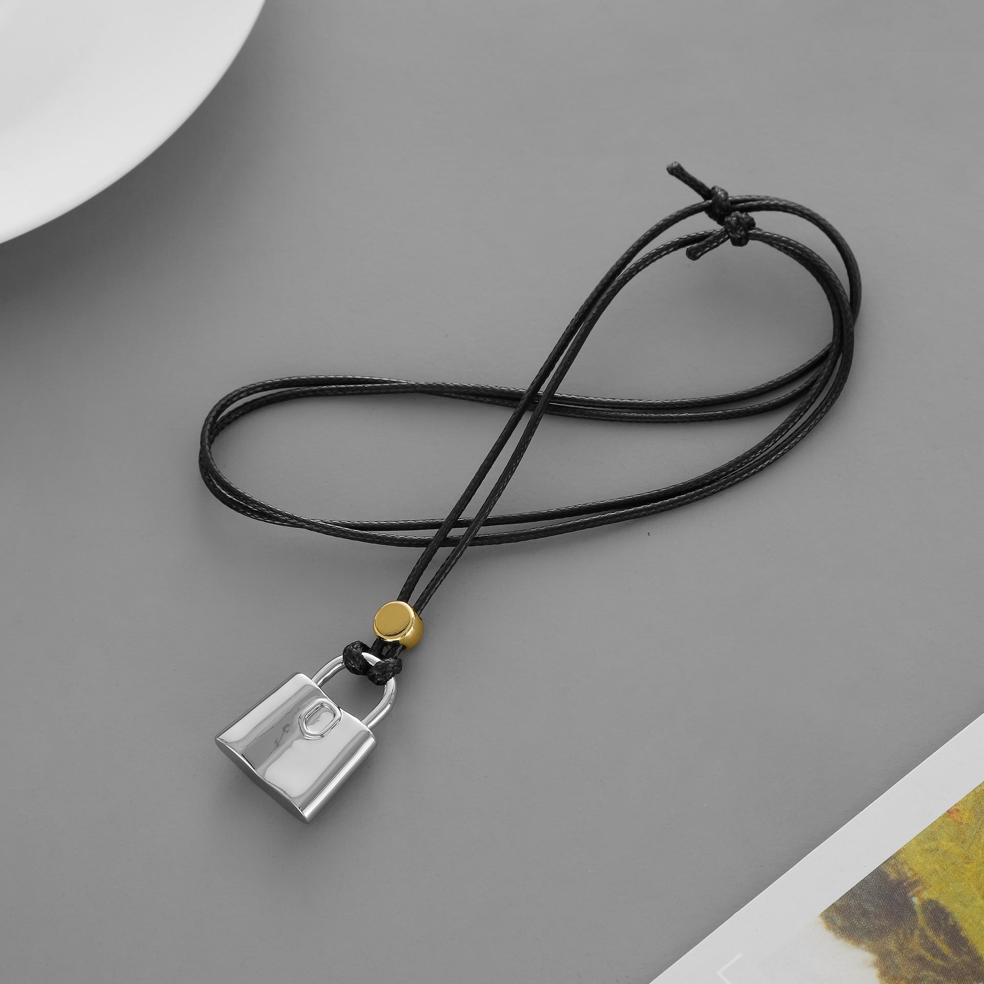 Lock Necklace For Women In Dyed Black Brass With Electroplated Finish, Featuring Twisted Rope Chain