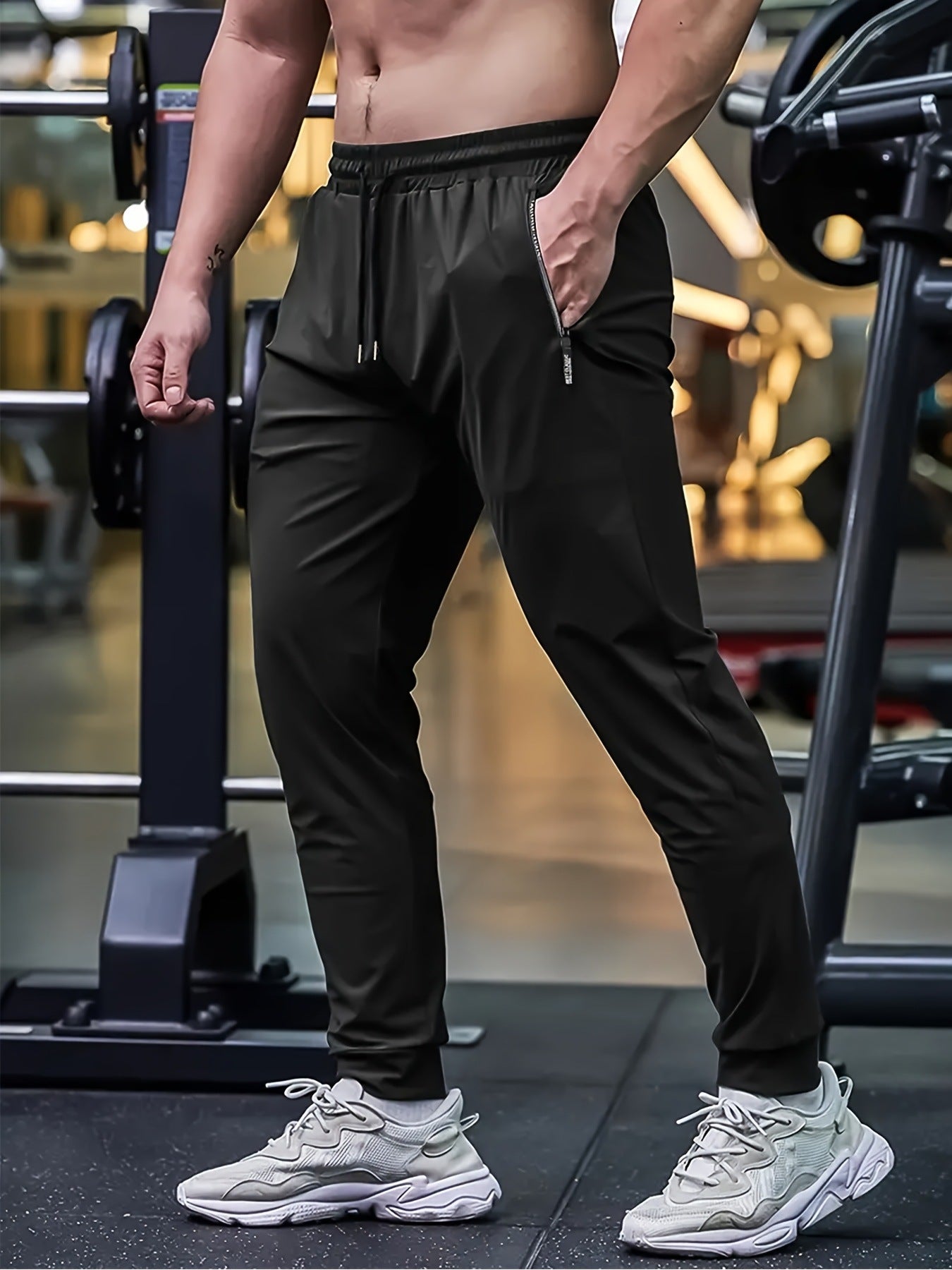 Men's Solid Color Full Length Jogging Pants In Nylon Fabric With Zipper Detail For Sport Style