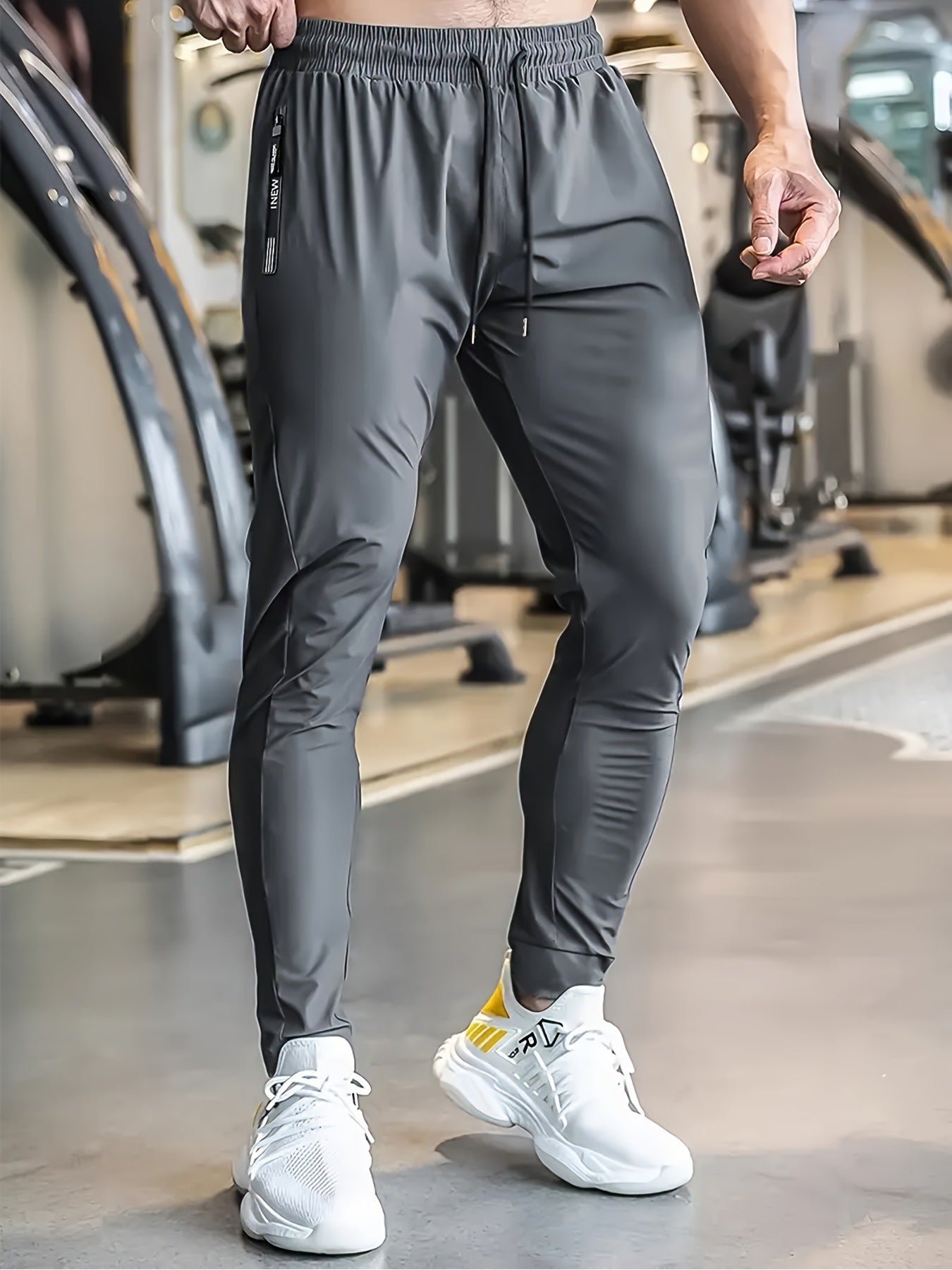 Men's Solid Color Full Length Jogging Pants In Nylon Fabric With Zipper Detail For Sport Style