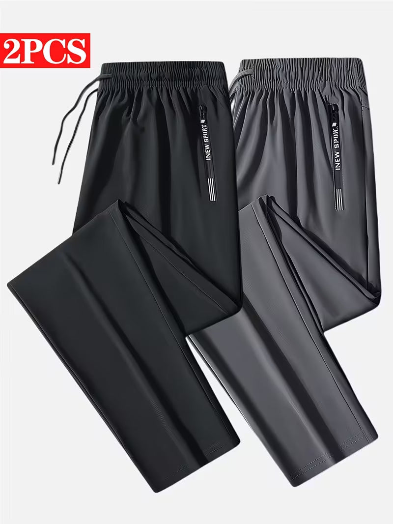 Men's Solid Color Full Length Jogging Pants In Nylon Fabric With Zipper Detail For Sport Style