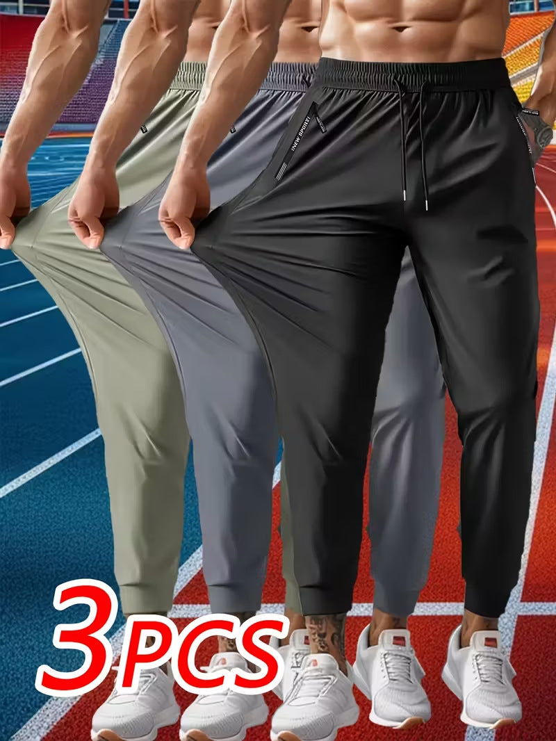 Men's Solid Color Full Length Jogging Pants In Nylon Fabric With Zipper Detail For Sport Style