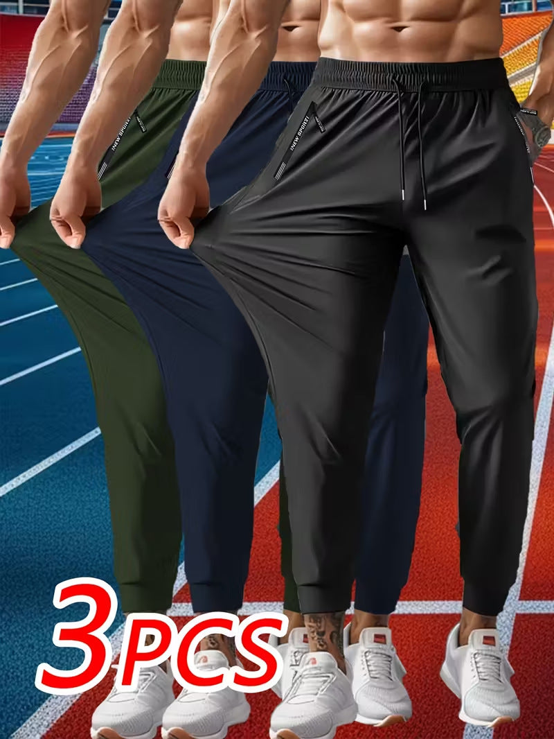 Men's Solid Color Full Length Jogging Pants In Nylon Fabric With Zipper Detail For Sport Style