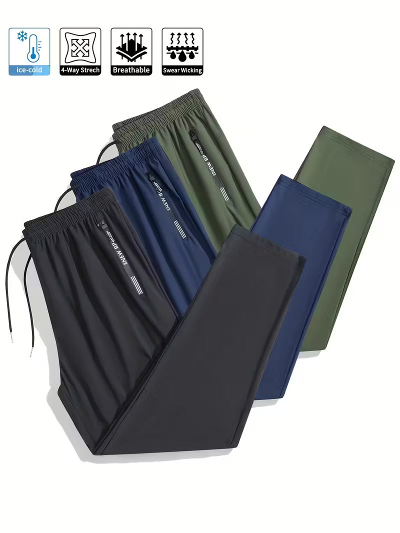 Men's Solid Color Full Length Jogging Pants In Nylon Fabric With Zipper Detail For Sport Style