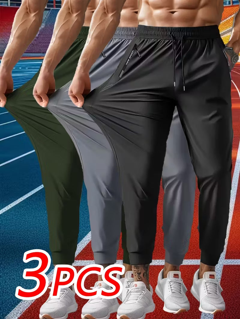 Men's Solid Color Full Length Jogging Pants In Nylon Fabric With Zipper Detail For Sport Style