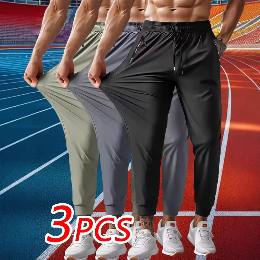Men's Solid Color Full Length Jogging Pants In Nylon Fabric With Zipper Detail For Sport Style