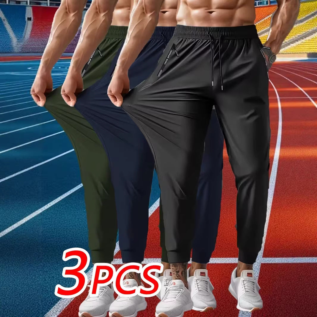 Men's Solid Color Full Length Jogging Pants In Nylon Fabric With Zipper Detail For Sport Style