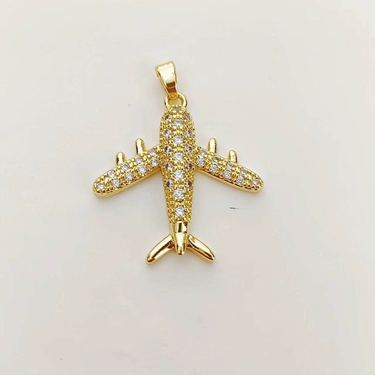 Airplane Pendant Made Of Brass With 18K Real Gold Plating Featuring Zircon Inlay