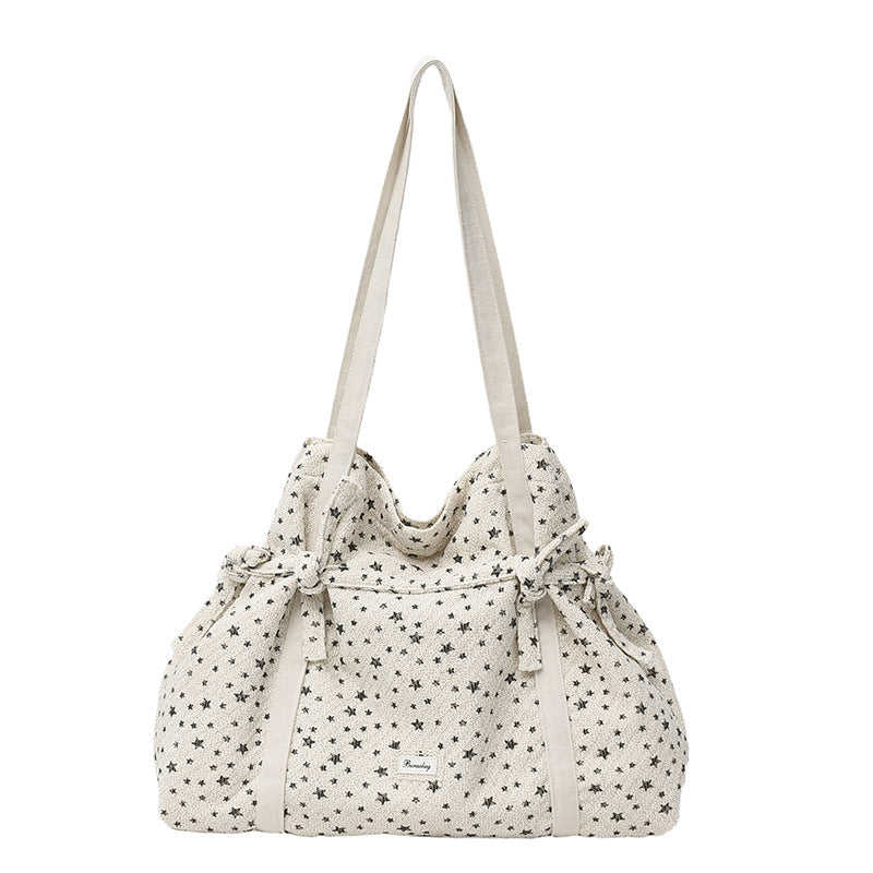 Ditsy Floral Canvas Dumpling Shape Shoulder Bag For Women With Single Shoulder Strap Featuring Flower Design
