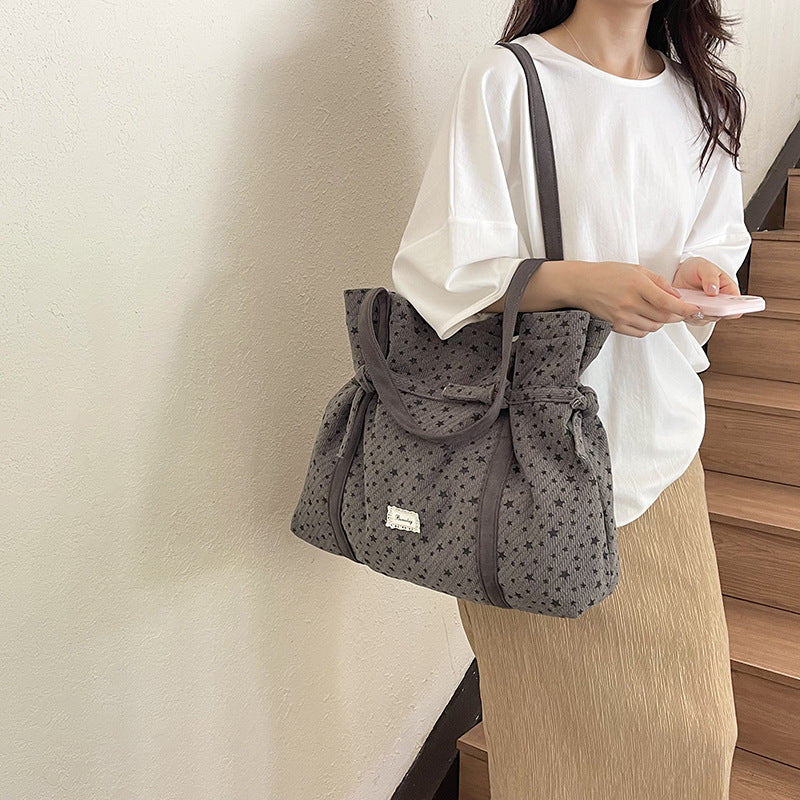 Ditsy Floral Canvas Dumpling Shape Shoulder Bag For Women With Single Shoulder Strap Featuring Flower Design