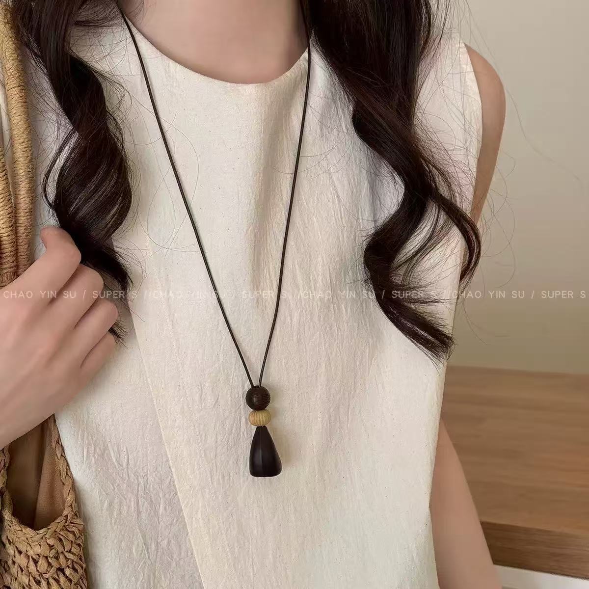 Bohemian Ethnic Long Necklace For Women Featuring Wood Carving Pendant On Cord String